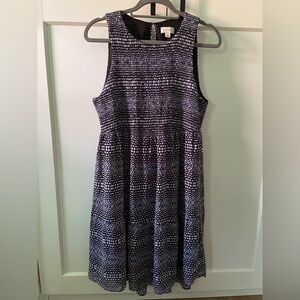 Sleeveless dress with rouching bodice detail